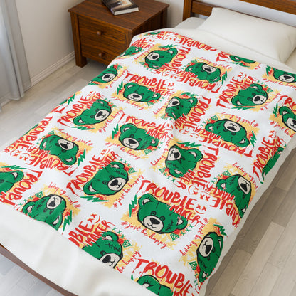 "Trouble Maker" Graphic Velveteen Plush Blanket – Soft White Throw with Green Bear & "Just Be Happy" Quote – Playful Decor 50" × 60"