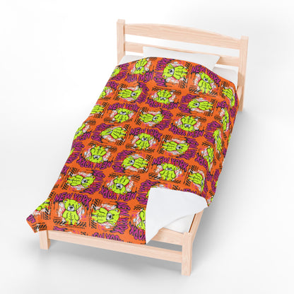 New York City Graphic Velveteen Plush Blanket – Soft Orange Throw with Green Bear – NYC Streetwear Souvenir Decor