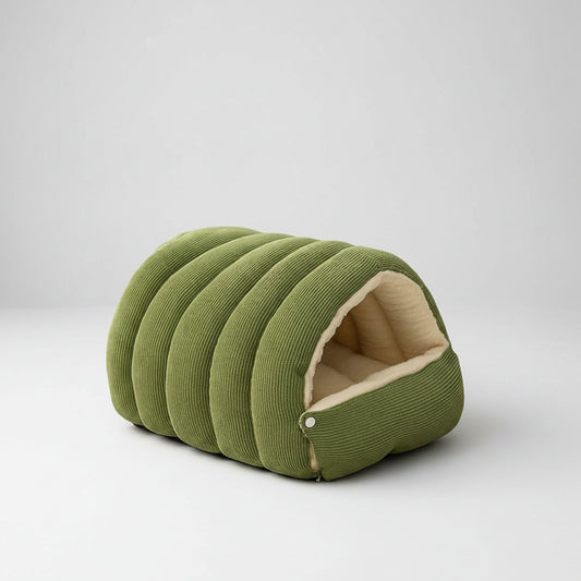 Green pet bed with beige interior on a white background