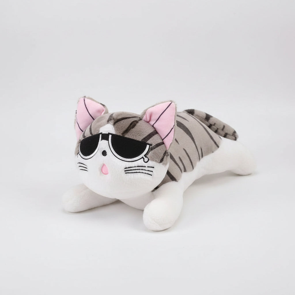 Plush toy cat with sunglasses on a wooden floor