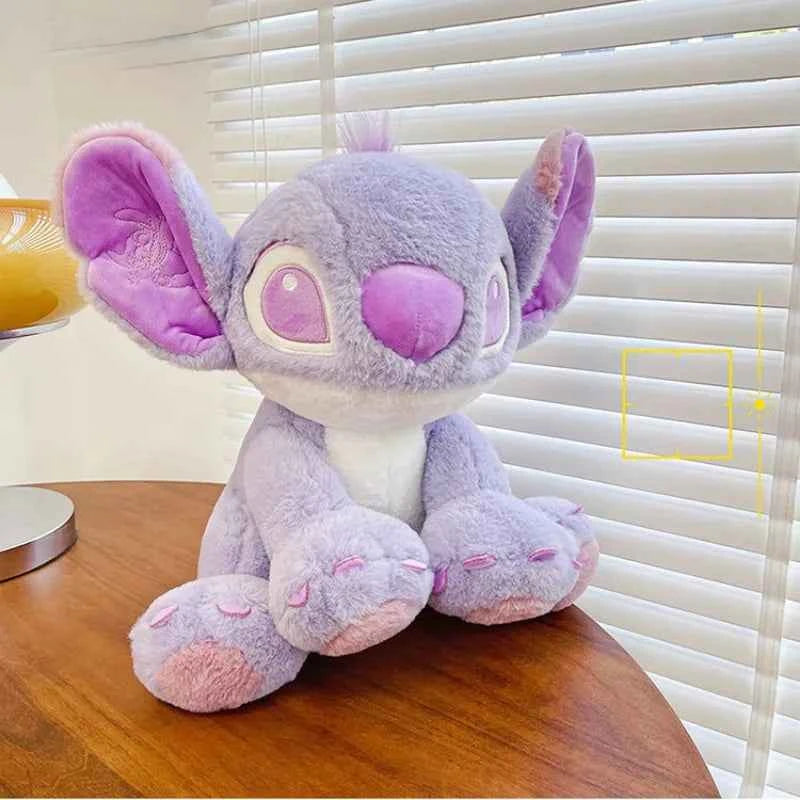 Purple Stitch plush toy with big ears and cute expression sitting upright