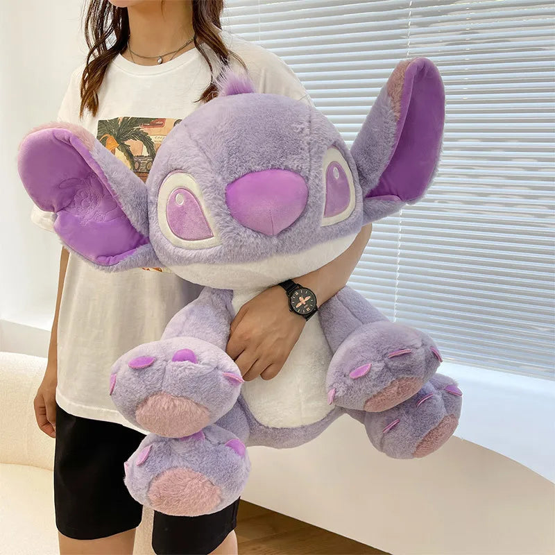 Purple Stitch plush toy with big ears and cute expression sitting upright