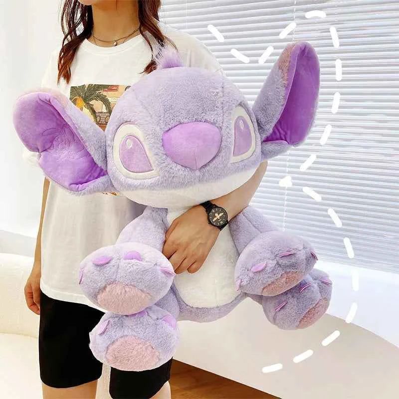 Purple Stitch plush toy with big ears and cute expression sitting upright