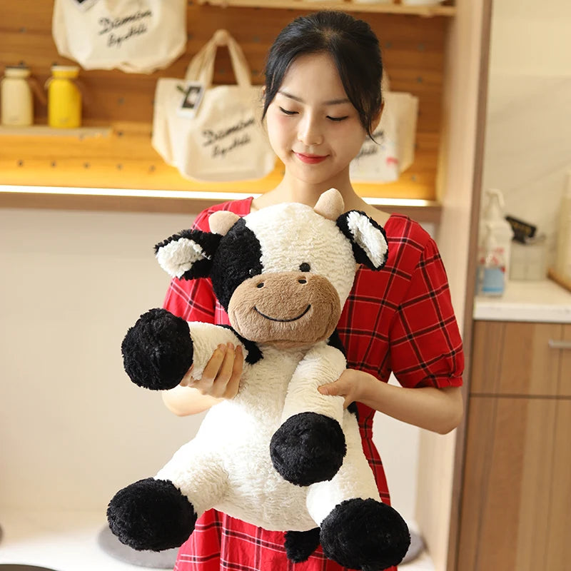 Kawaii Sitting Milk Cow Plush Toy – Lifelike Stuffed Cattle Doll (25–70cm)
