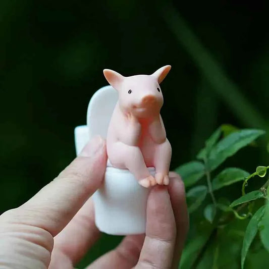 Adorable Pink Pig on Toilet Figurine - Whimsical PVC Decor Pig