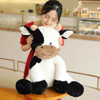 Kawaii Sitting Milk Cow Plush Toy – Lifelike Stuffed Cattle Doll (25–70cm)