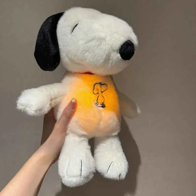 Soft glowing breathing puppy plush toy helping with sleep and anxiety relief